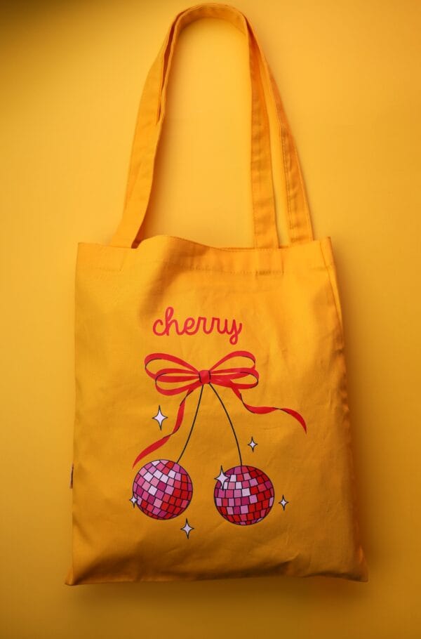 ნაჭრის ჩანთა დისკოს ალუბალის პრინტით - "ბიბლუსი"